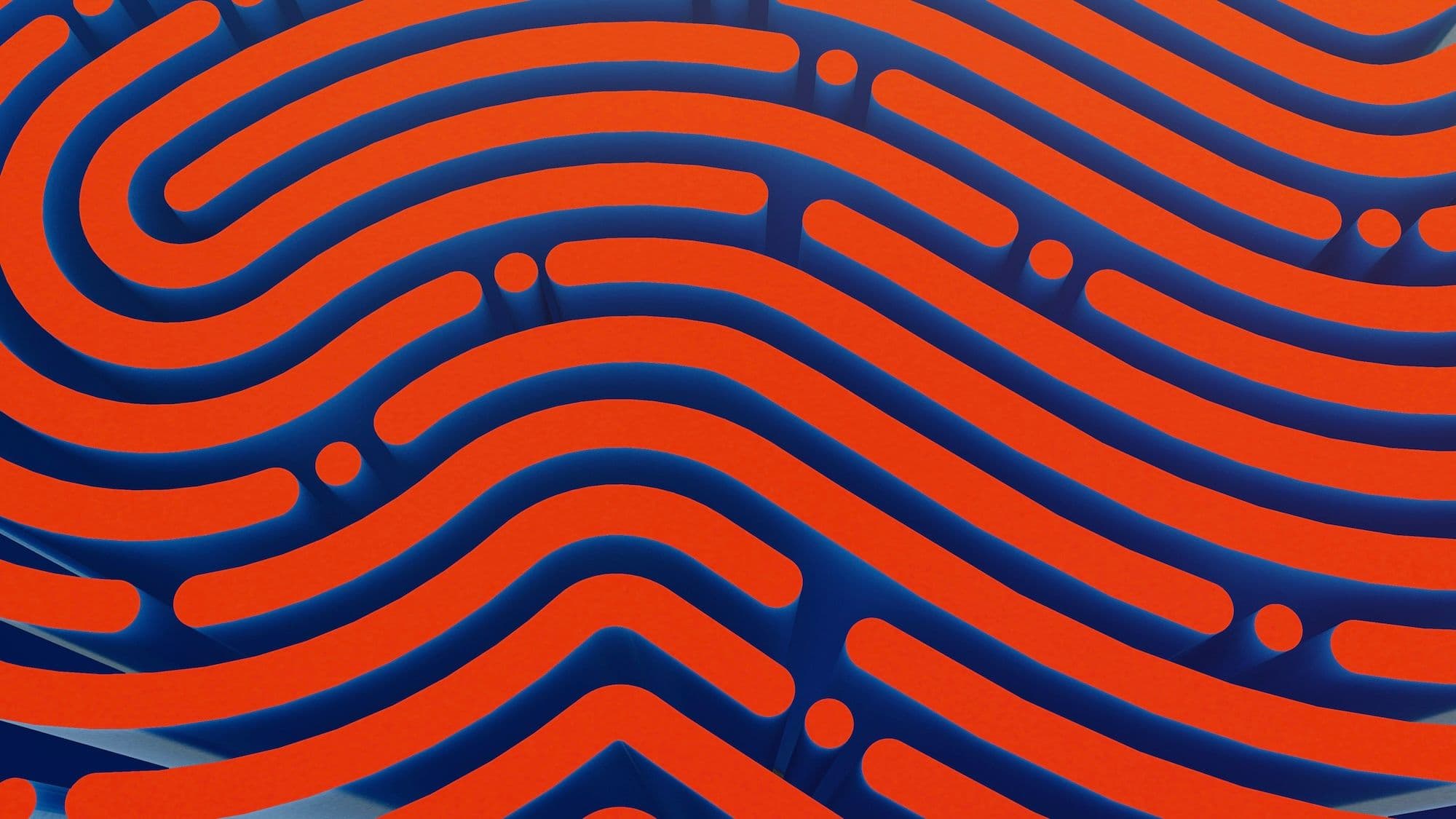Abstract pattern in red and blue. Via Arthur Mazi / Unsplash.